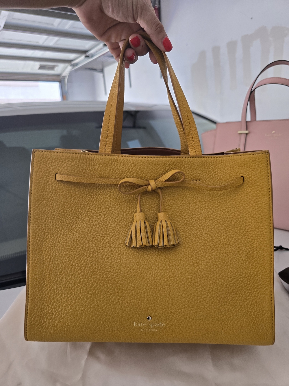 Kate Spade New York Hayes Street Leather Isobel in Saffron